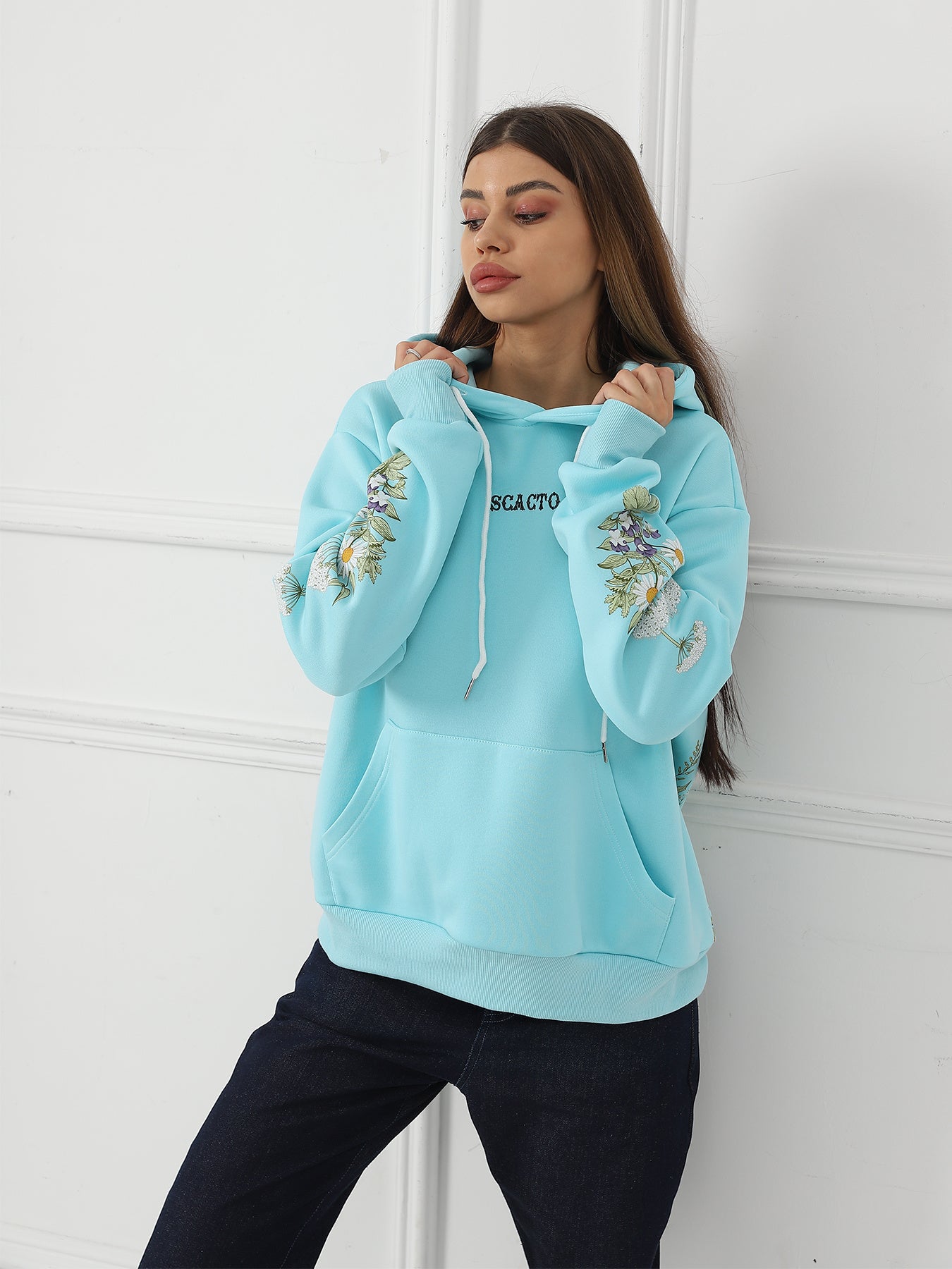 a Women's Solid Color Floral Long Sleeved Sweatshirt
