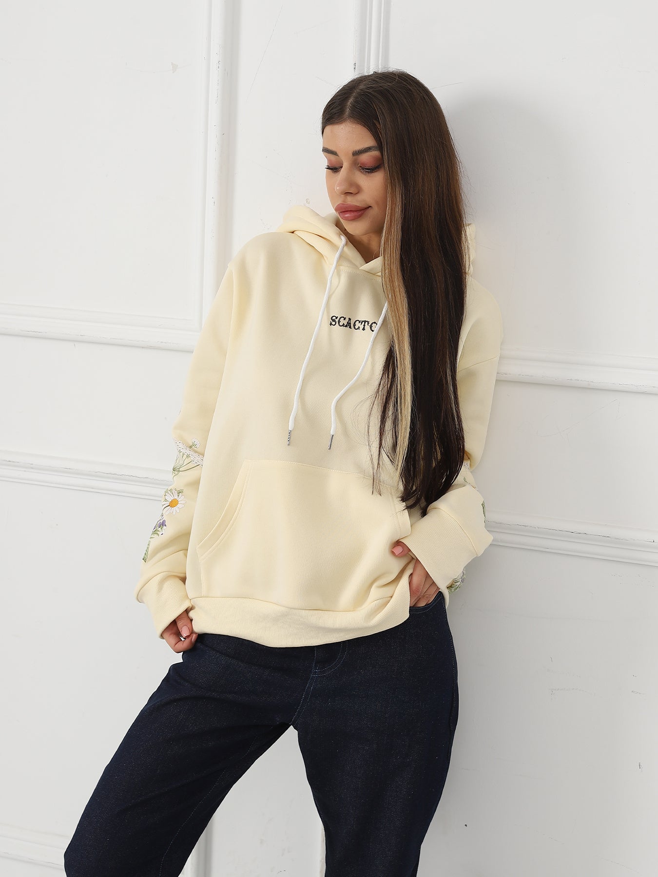 a Women's Solid Color Floral Long Sleeved Sweatshirt