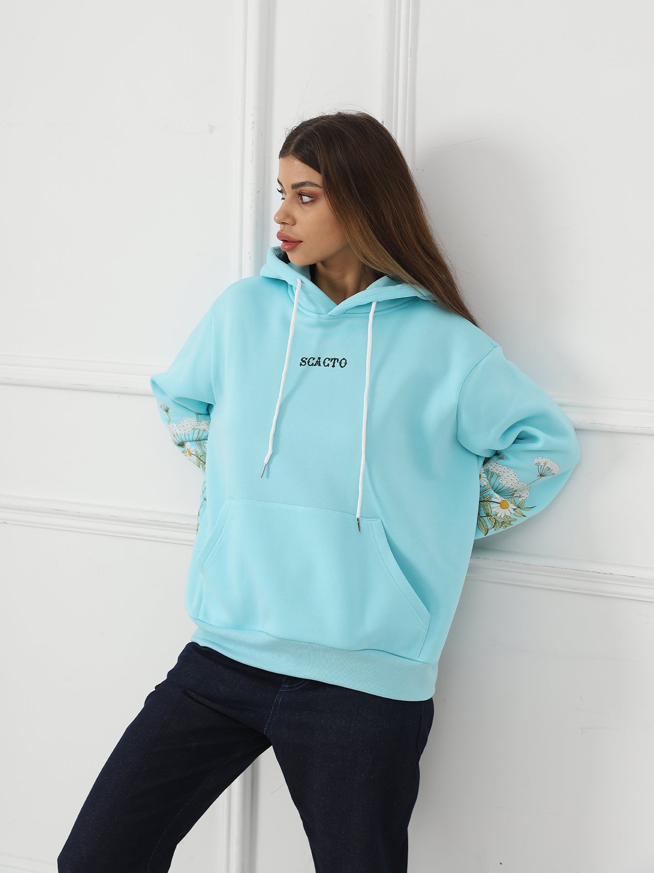 a Women's Solid Color Floral Long Sleeved Sweatshirt