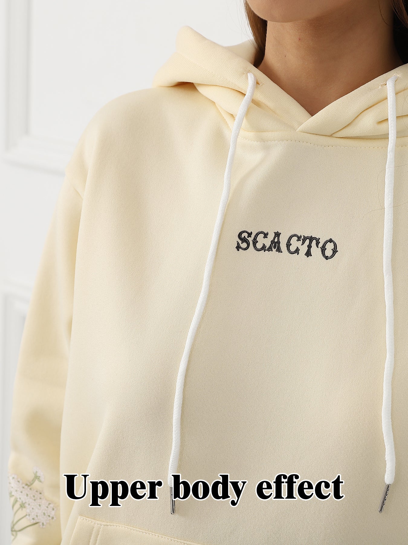 a Women's Solid Color Floral Long Sleeved Sweatshirt